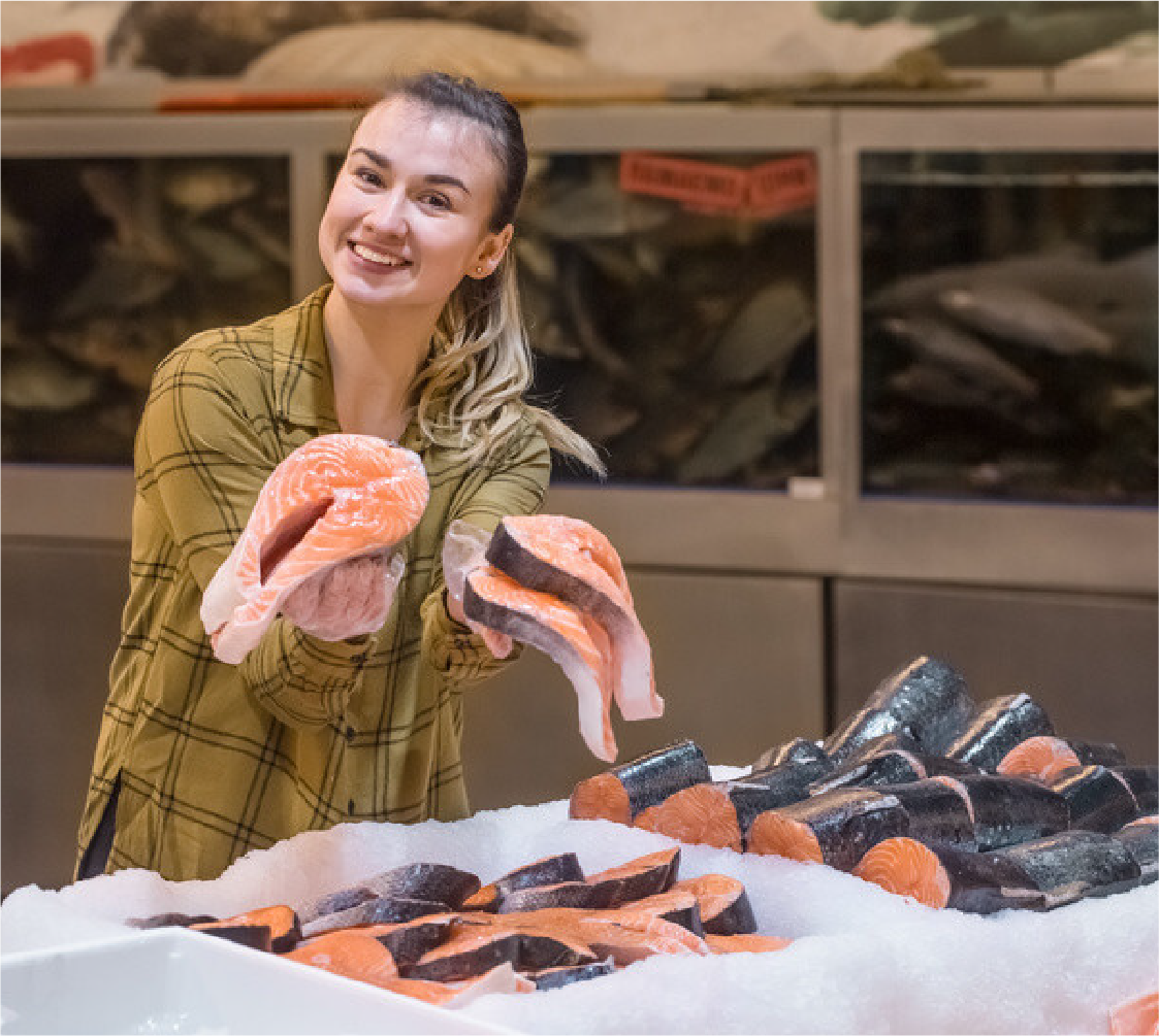 Woman selecting fresh fish